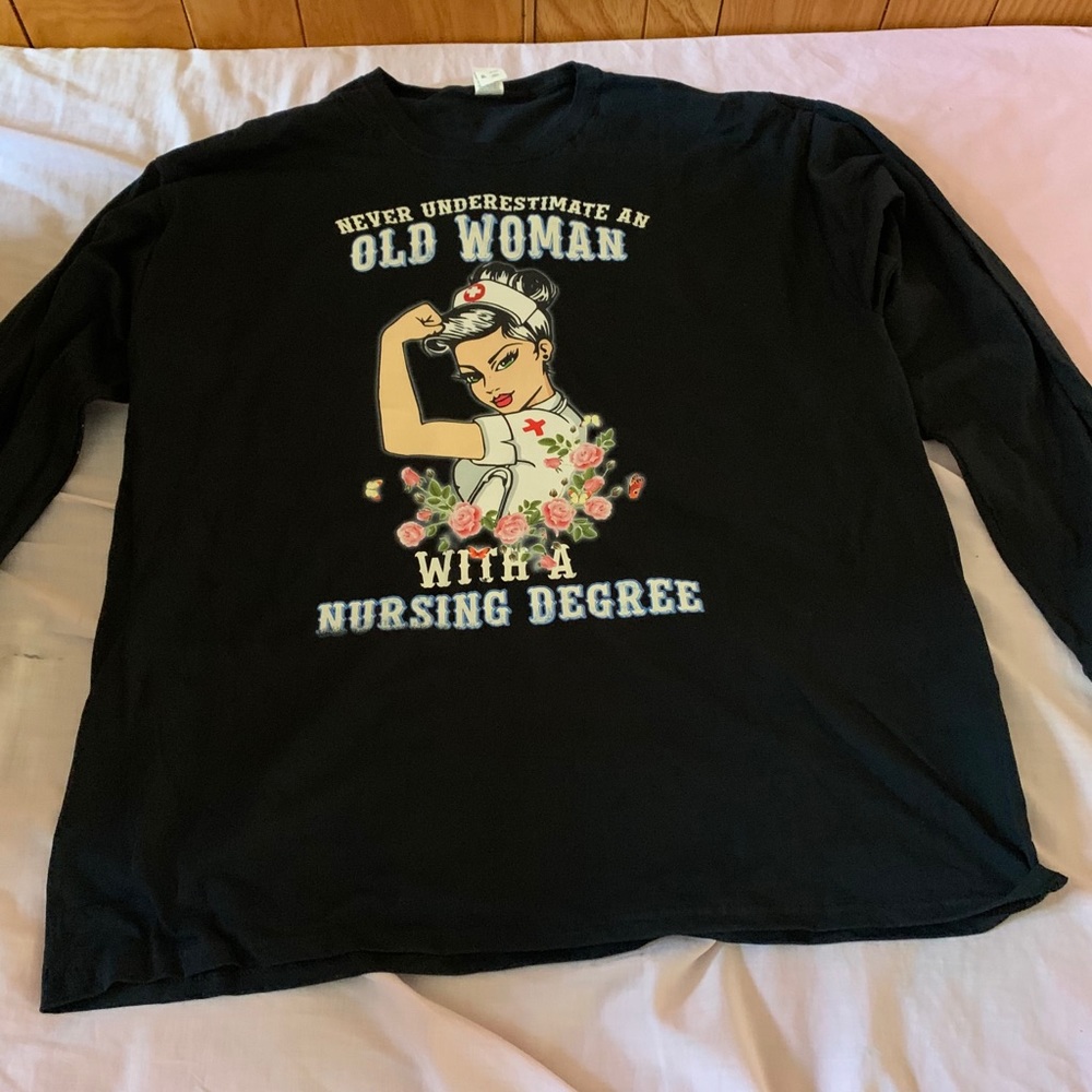 Brand new never underestimate an old women shirt